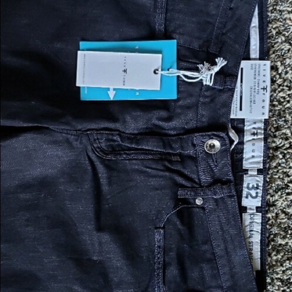 Unworn black denim men’s pants